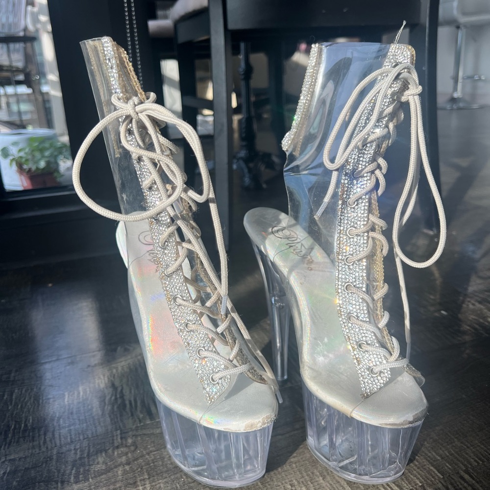 Pleaser’s Adore-1016C-2 7” Clear lace up ankle boots.